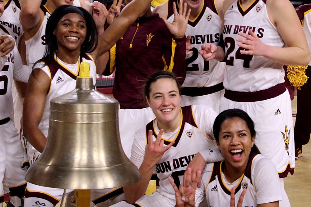 The Arizona State women's basketball team celebrates their victory over Utah on Sunday, Jan. 17, 2015, in Wells Fargo Arena in Tempe.