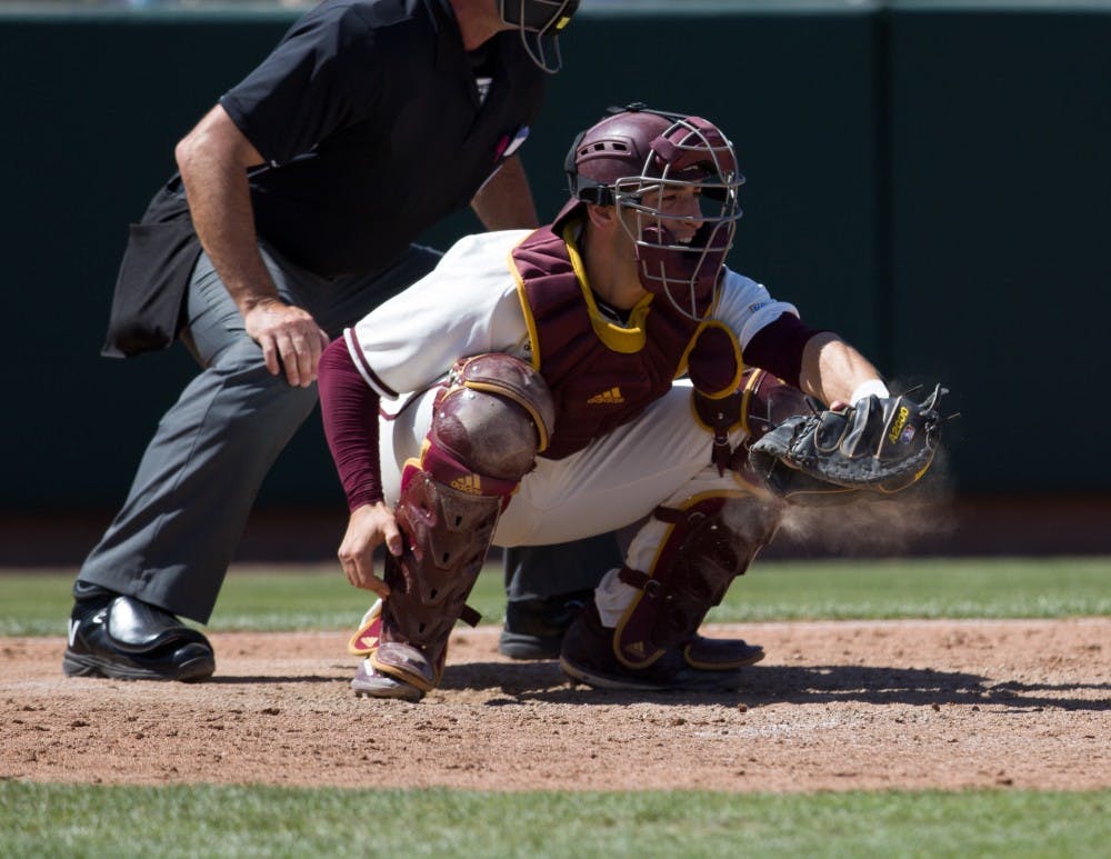 ASU senior catcher Zach Cerbo (30) catches a pitch during game three of a baseball series against the UCLA Bruins at Phoenix Municipal Stadium in Phoenix on April 2, 2017.