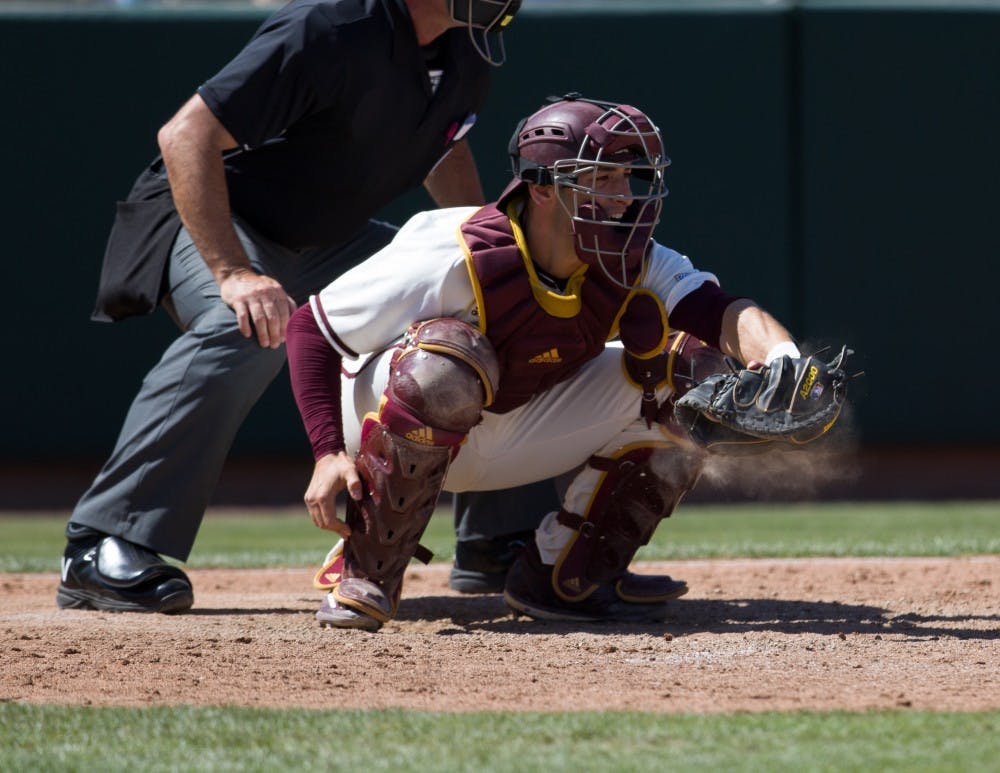 ASU senior catcher Zach Cerbo (30) catches a pitch during game three of a baseball series against the UCLA Bruins at Phoenix Municipal Stadium in Phoenix on April 2, 2017.