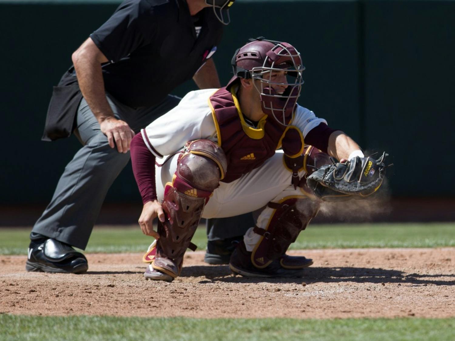 ASU senior catcher Zach Cerbo (30) catches a pitch during game three of a baseball series against the UCLA Bruins at Phoenix Municipal Stadium in Phoenix on April 2, 2017.