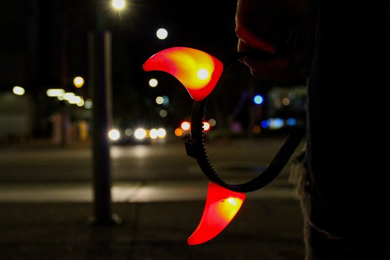 An ASU student holds devil horns as part of a last-minute Halloween costume idea in Phoenix, Arizona, on Wednesday, Oct. 24, 2018.&nbsp;