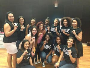 Members of&nbsp;Omega Phi Chi at the&nbsp;Multicultural Open House on Aug. 29, 2013.&nbsp;