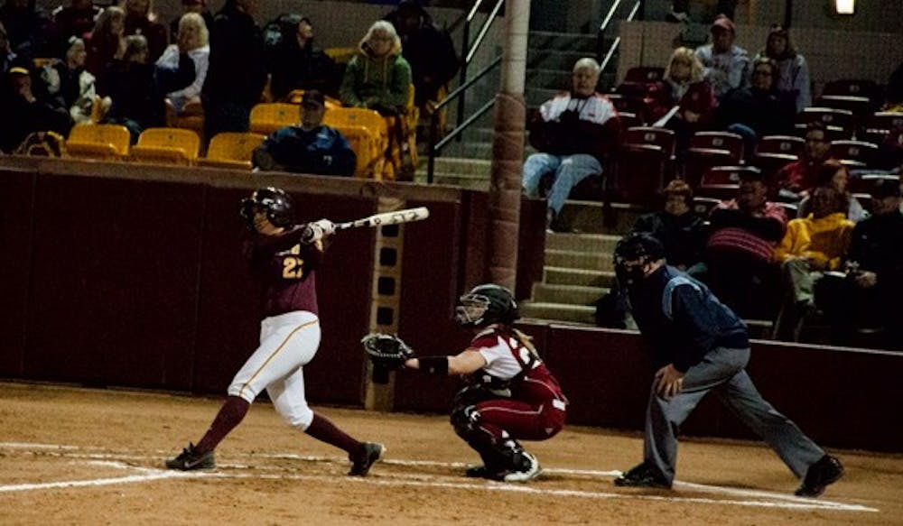 Junior infielder Cheyenne Coyle follows through on a swing on Feb. 9. Coyle started off the season with three homers in two games. (Photo by Abhiram Chandrash)