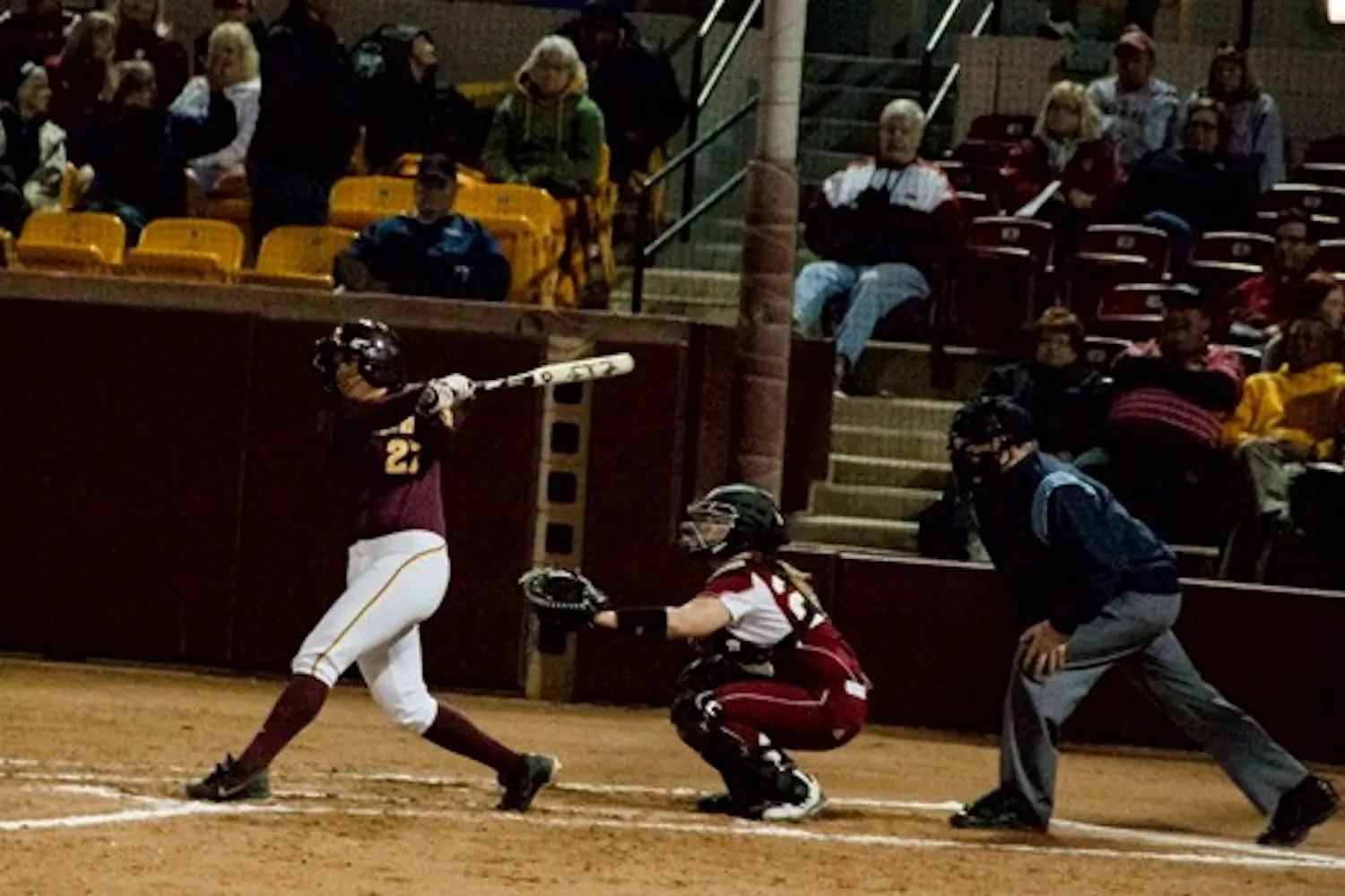 Junior infielder Cheyenne Coyle follows through on a swing on Feb. 9. Coyle started off the season with three homers in two games. (Photo by Abhiram Chandrash)