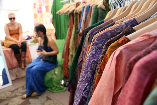 Audrey Acosta Designs, based in Northern California, set up shop on Hayden Lawn on the Tempe campus this week. The clothes and jewelry are handmade with recycled materials. (Photo by Jenn Allen)