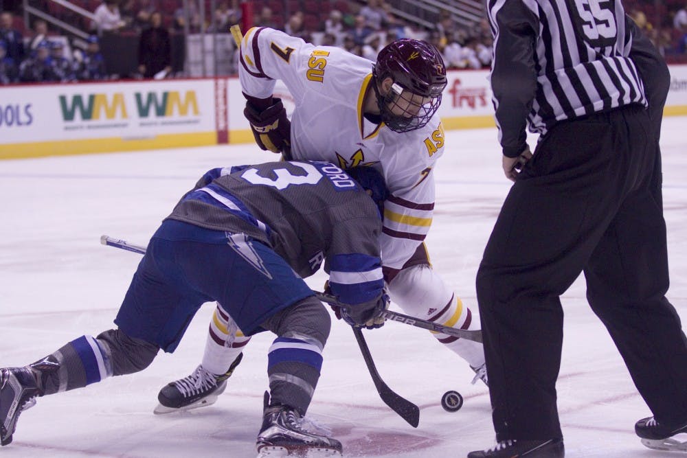 ASU freshman center Georgy Gorodetsky (7) wins a faceoff during the first period of a 5-2 victory against Air Force in Gila River Arena in Glendale, Arizona, on Sunday, Oct. 16, 2016.