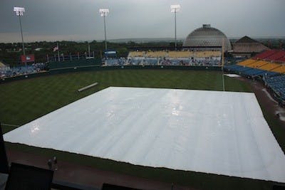 The rains have been the biggest player at Rosenblatt Stadium today. (Photo by Nick Kosmider)