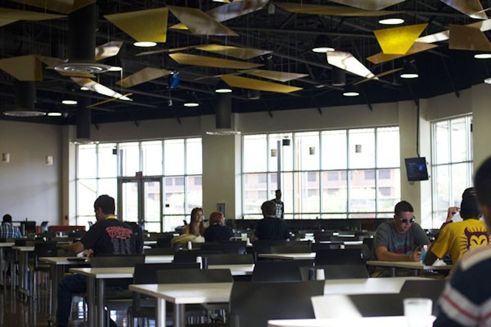 Students eat lunch Aug. 23 at the Polytechnic campus.  Both Polytechnic and West campuses opened their new residence and dining halls this semester.  (Photo by Vince Dwyer)