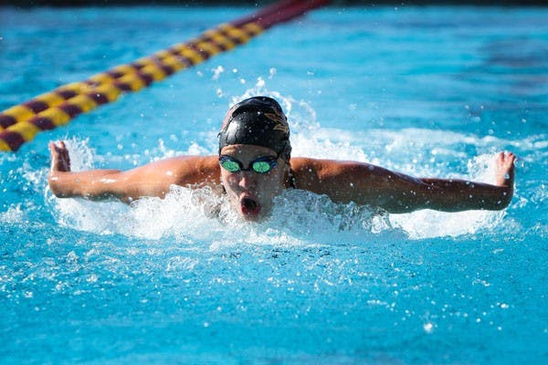 Sophomore Lori Layne Kremer strides through the water during ASU's home swim meet vs. BYU on Jan. 12.