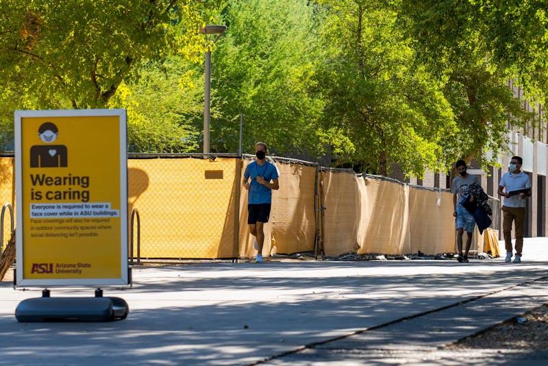 Students walk around the Tempe campus during move-in on Saturday, Aug. 15, 2020.