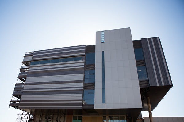 Interns from the School of Construction at ASU are helping with the development of the new Sun Devil Marketplace, opening in August.  Current ASU students and ASU alumni are involved in this project. (Photo by Ryan Liu)
