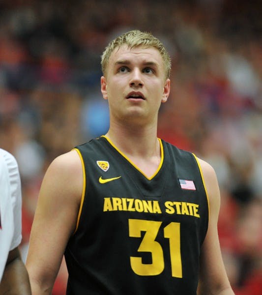 Jonathan Gilling looks at the scoreboard during a game against UA on Dec. 31, 2011. In his freshman season, Gilling averages 5.1 points per game. (Photo by Aaron Lavinsky)