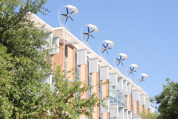 WRITING HISTORY: Jin Ho Jo makes history as the first PhD to graduate from ASU's School of Sustainability. (Photo by Andy Jeffreys)