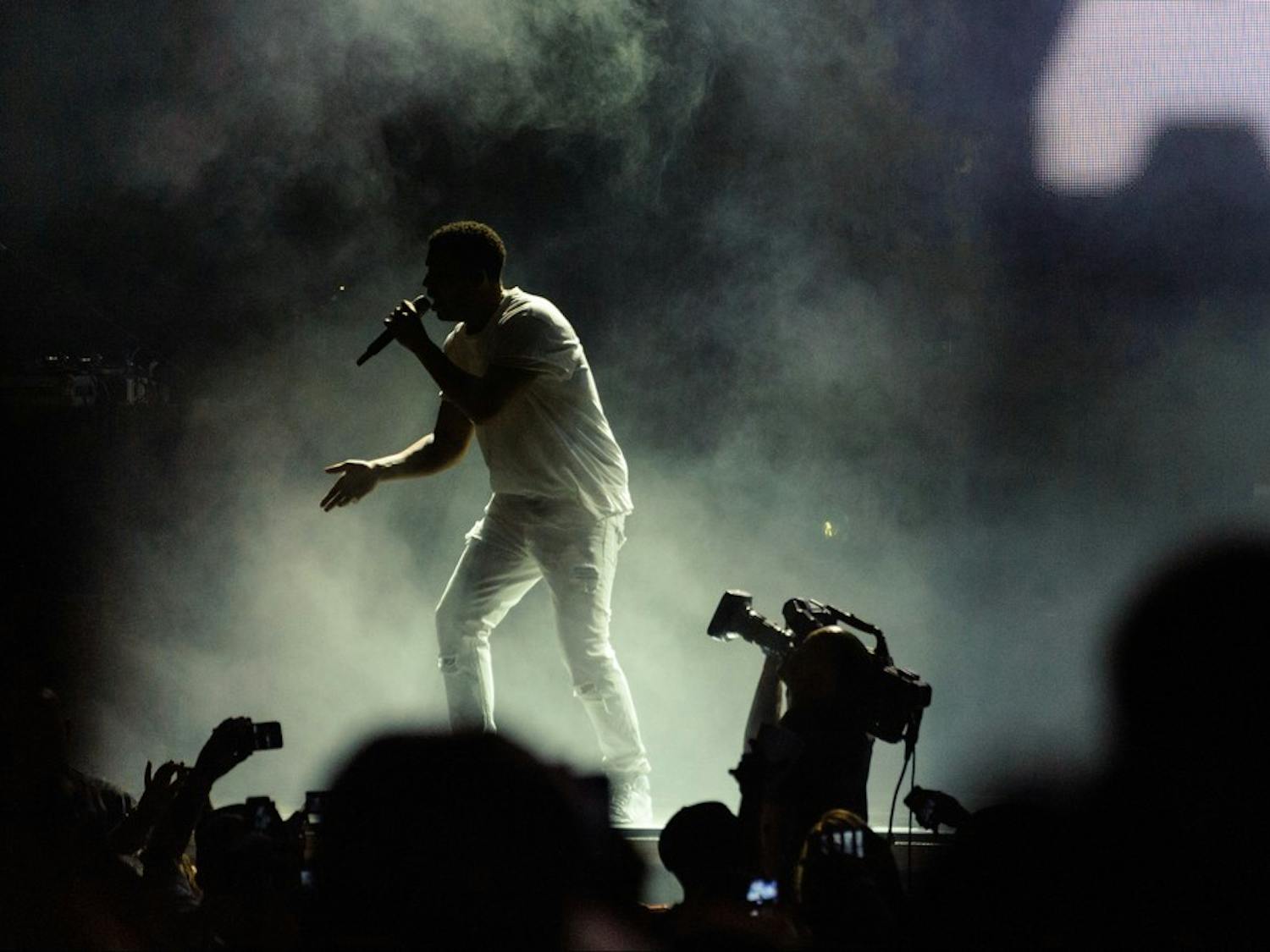 Drake performs at the Ak-Chin Pavilion in Phoenix on Thursday, Sept. 25, 2014. The rapper shared the bill with Lil Wayne in a show entitled 'Drake vs Lil Wayne.'