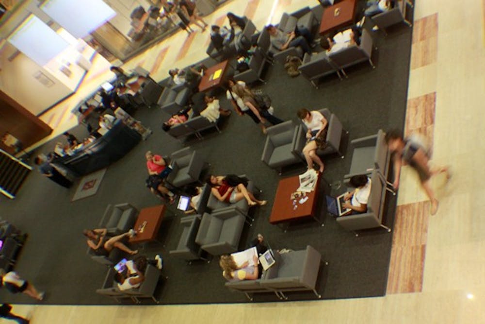 BACK TO THE GRIND: Third day back to school and students are getting into the groove, studying or taking a break in the Downtown University Center at the Cronkite School. (Photo by Lillian Reid)