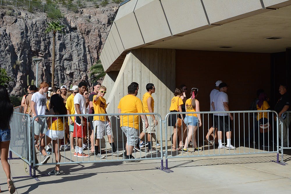 Students line up for ticket distribution before ASU football's home opener on Saturday, Sept. 13, 2015, outside Wells Fargo Arena in Tempe.