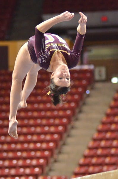Precision Balance: Even with a career high score of 9.800 on the beam, ASU junior Kelly Reilly and the Sun Devils couldn’t top Oregon State in Tempe on Sunday. ASU recently found out that two of its gymnasts are done competing for the season due to knee injuries. (Photo by Aaron Lavinsky)