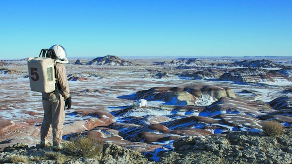 LIFE ON MARS: Jim Crowell, co-founder and president of Students for the Exploration and Development of Space, stands atop a ridge in Utah during a trip meant to  simulate the harsh environment found on Mars.  (Photo courtesy of Jim Crowell)