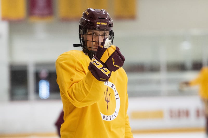 Junior defenseman Gvido Jansons (3) gives the thumbs-up during practice on Tuesday, Oct. 1, 2019, at Oceanside Ice Arena in Tempe, Arizona.