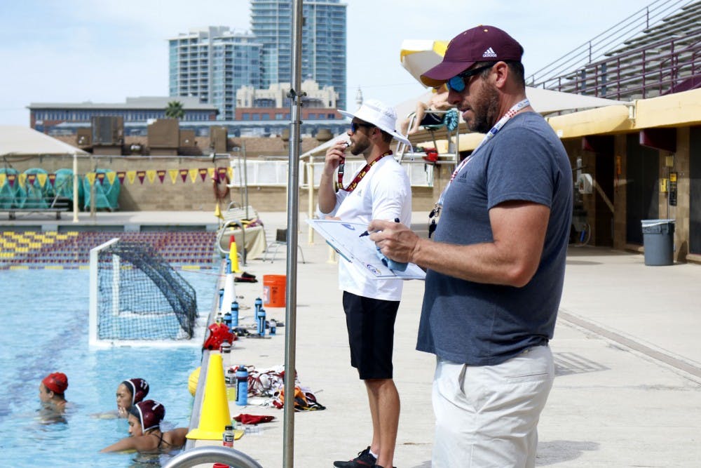 Women’s water polo head coach Todd Clapper coaches the team during practice at the Mona Plummer Aquatic Center in Tempe, Arizona on Wednesday, March 15, 2017.