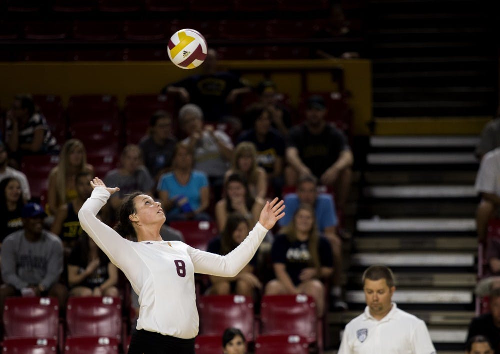 Senior Whitney Follette serves during Tuesday's game against the Lumberjacks on Tuesday, Sept. 8, 2015 at Wells Fargo Arena in Tempe. The Sun Devil volleyball squad beat the visiting Northern Arizona University Lumberjacks 3-1 (25-17, 13-25, 25-13, 25-20), improving to a perfect 7-0 overall record. 