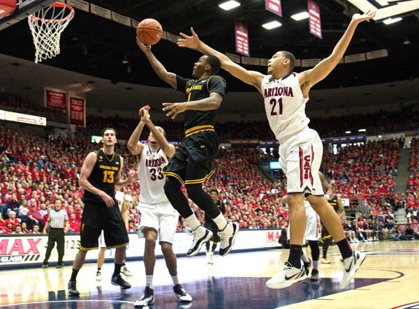 Redshirt freshman Jahii Carson glides through the air on a layup against UA on March 9. Carson has lived up to the hype this season and the Sun Devils success next year greatly depends on whether he returns. (Photo by Dominic Valente)