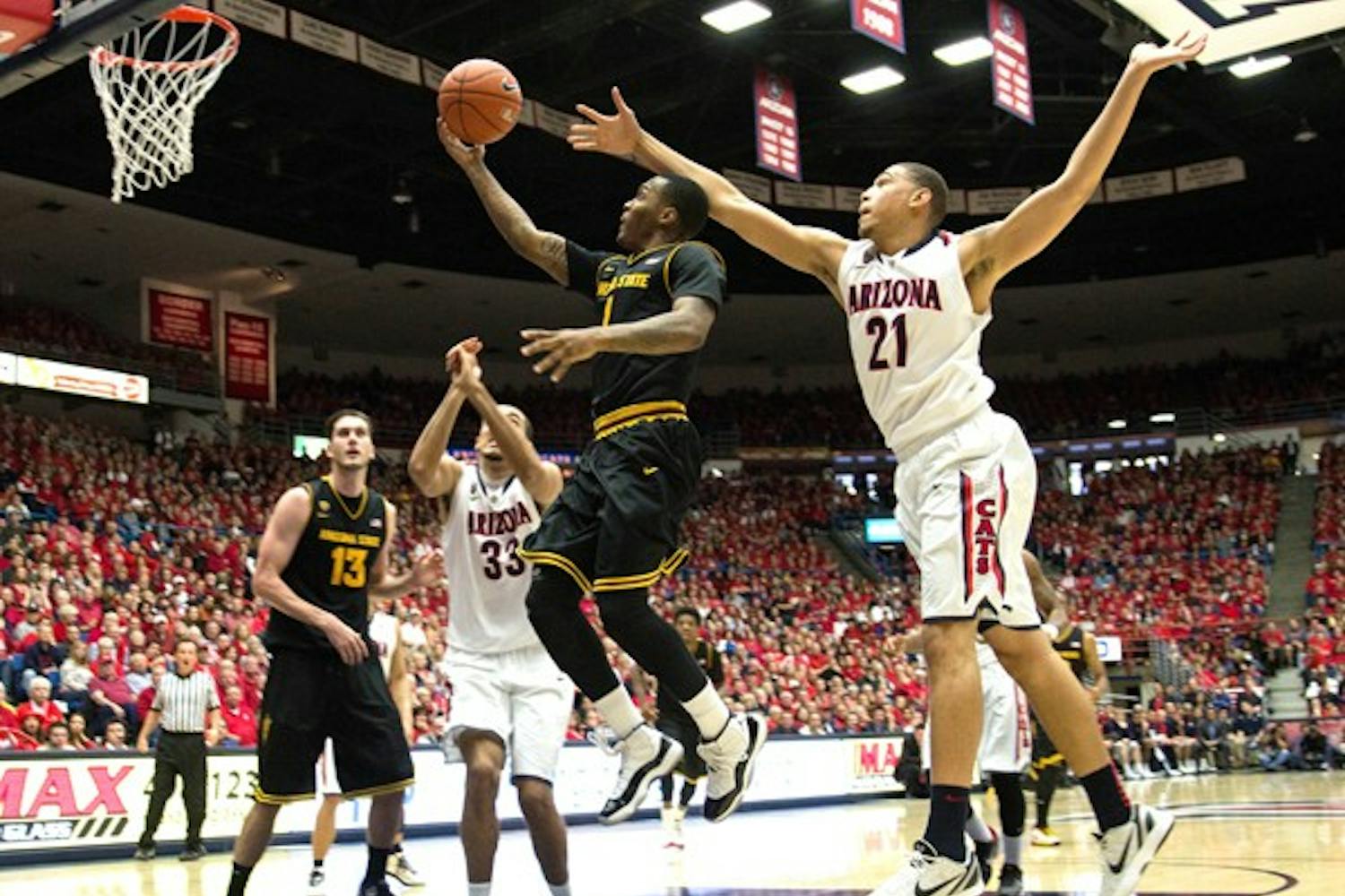 Redshirt freshman Jahii Carson glides through the air on a layup against UA on March 9. Carson has lived up to the hype this season and the Sun Devils success next year greatly depends on whether he returns. (Photo by Dominic Valente)
