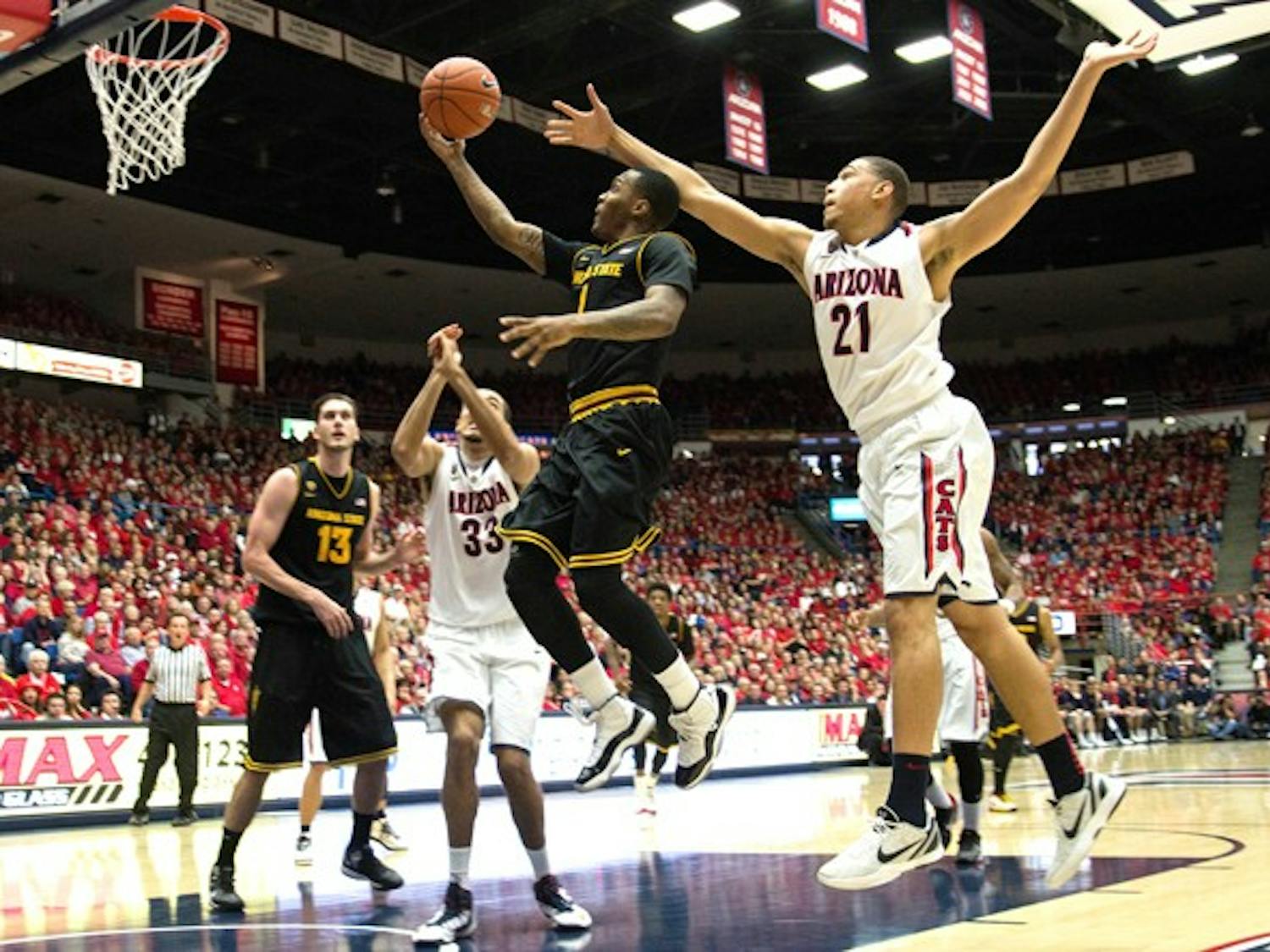 Redshirt freshman Jahii Carson glides through the air on a layup against UA on March 9. Carson has lived up to the hype this season and the Sun Devils success next year greatly depends on whether he returns. (Photo by Dominic Valente)