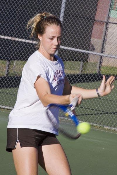 FOLLOW THROUGH: Sophomore Hannah James returns a volley in practice last week. James is ranked 99th in the country in preseason rankings. (Photo by Annie Wechter)