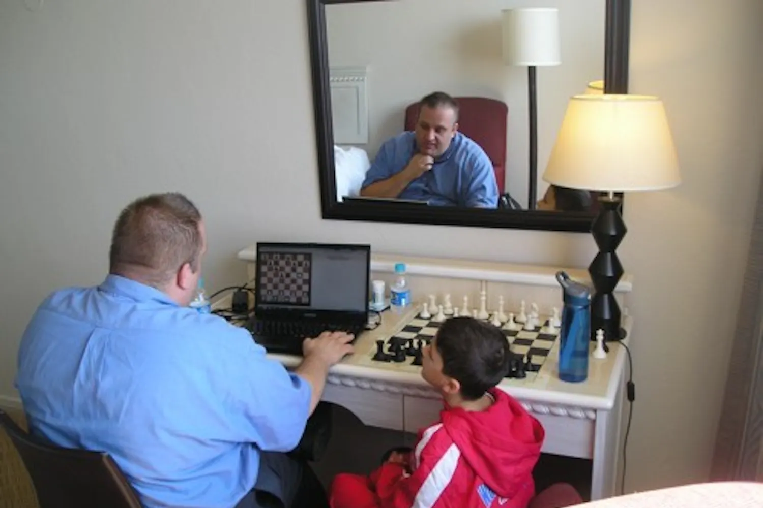 Justin Friedlander preps for his chess games with GM Finegold for Round 7. (Photo Courtesy of Robert Friedlander)