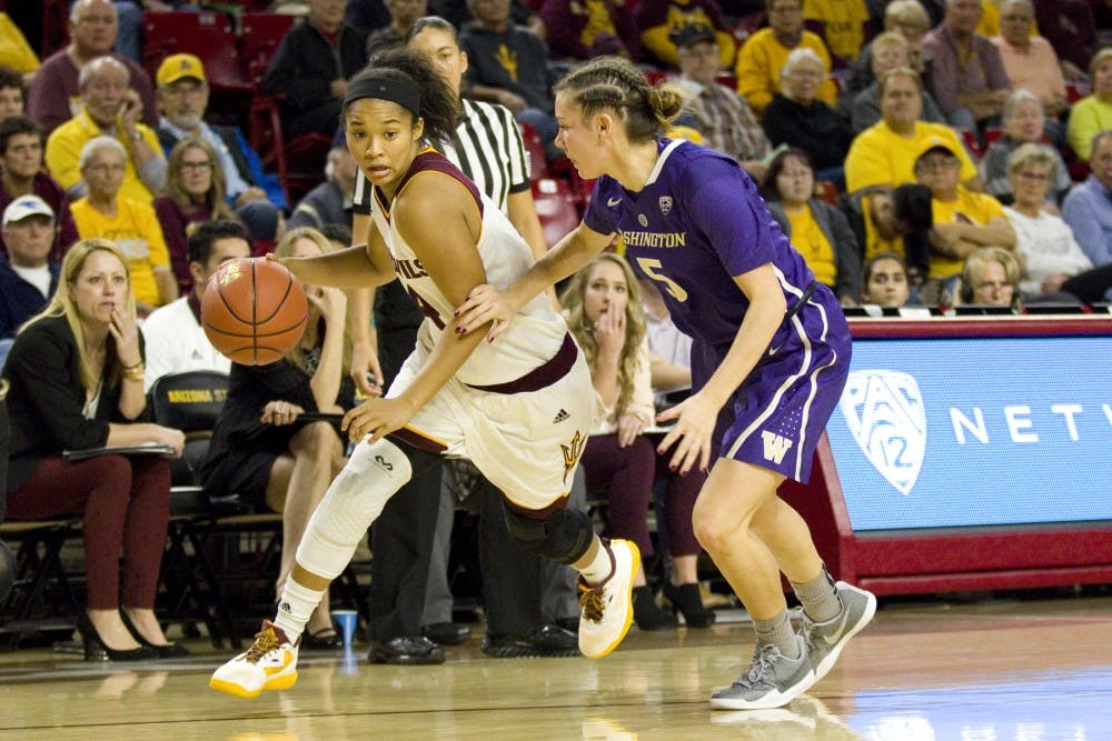 ASU freshman guard Kiara Russell (4) looks to drive baseline towards the basket during a women's basketball game versus no. 8 Washington in Wells Fargo Arena in Tempe, Arizona on Sunday, Jan. 15, 2017. ASU lost 65-54, putting them at 13-4 on the season.