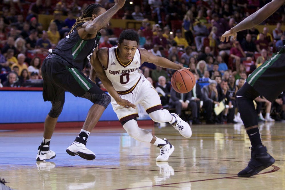 Junior Tra Holder (0) pushes past Portland defense in an ASU men’s basketball game against Portland State at Wells Fargo Arena on Friday, Nov. 11, 2016.