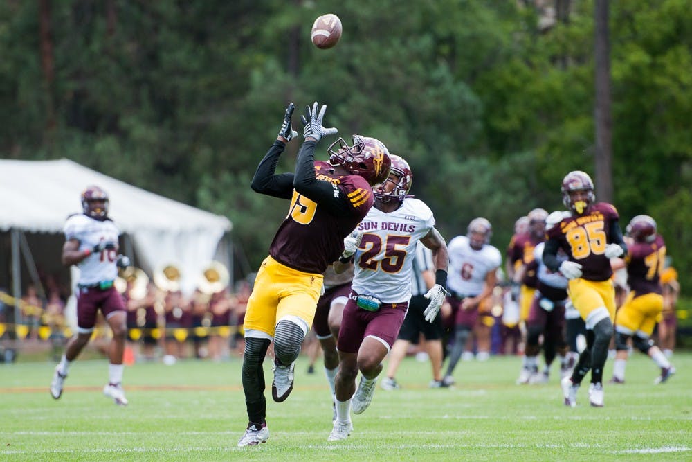 Redshirt sophomore wide receiver Ellis Jefferson catches a pass during the last day of Camp Tontozona on Saturday, Aug. 15, 2015, in Payson, Arizona.