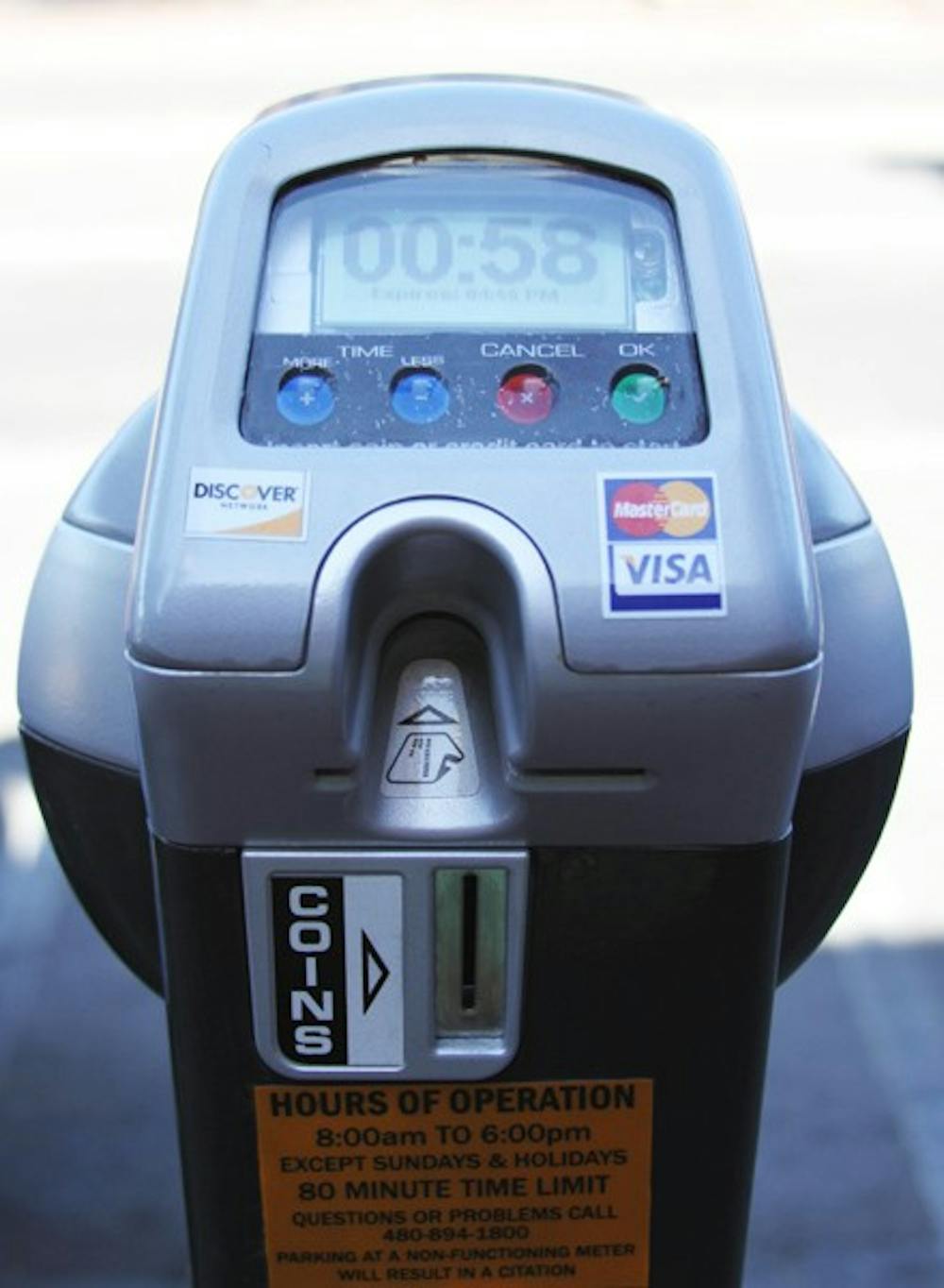 NEXT GENERATION:  The city of Tempe has installed new parking meters on Mill Avenue between Third Street and University Drive.  The meters feature electronic readings that include the exact time the meter will run out and an option to pay with coins or major credit cards. (Photo by Lisa Bartoli)