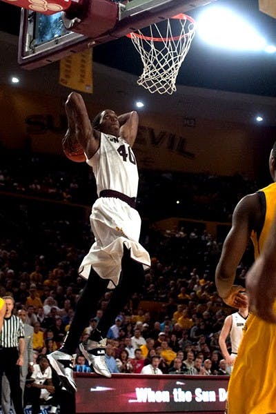 Senior forward Shaquielle McKissic dunks the ball in a game against California University on March 1. (Photo by Mario Mendez) 