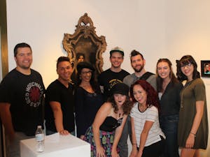 Rosemarie Dombrowski (third from left) and her students pose for a photo at {9} The Gallery on Grand Avenue in Phoenix.