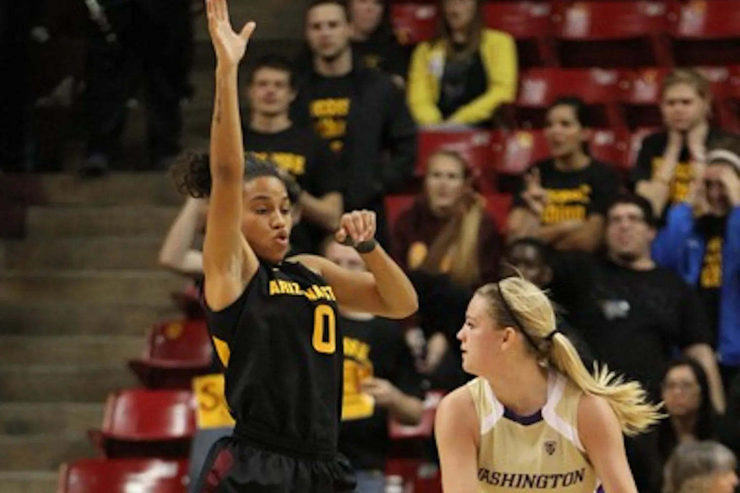 Senior Olivia Major plays animated defense in a game against Washington on Feb. 16. Major led ASU with 14 points as the Sun Devils defeated the Huskies 47–41. (Photo by Sam Rosenbaum)