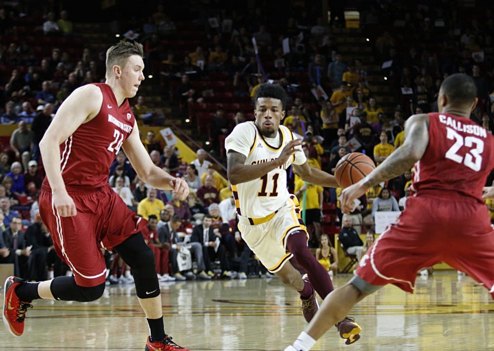 ASU junior Shannon Evans II (11) drives past defense towards the basket in a men's basketball game against Washington State in Wells Fargo Arena in Tempe, Arizona on Sunday Jan. 29, 2017. ASU lost the game 83-91.