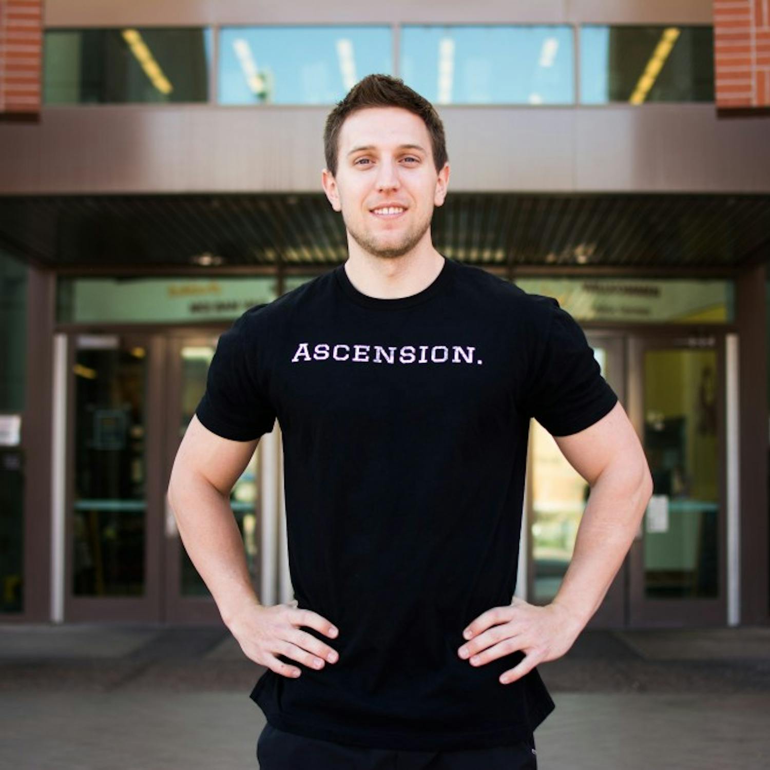 TJ Uli, 21-year-old biochemistry senior at ASU, poses outside of ASU Tempe’s Sun Devil Fitness Complex on Jan. 18, 2017. Uli sports a t-shirt from his recently launched apparel line “Ascension. Athletic Apparel and Lifestyle”. 
