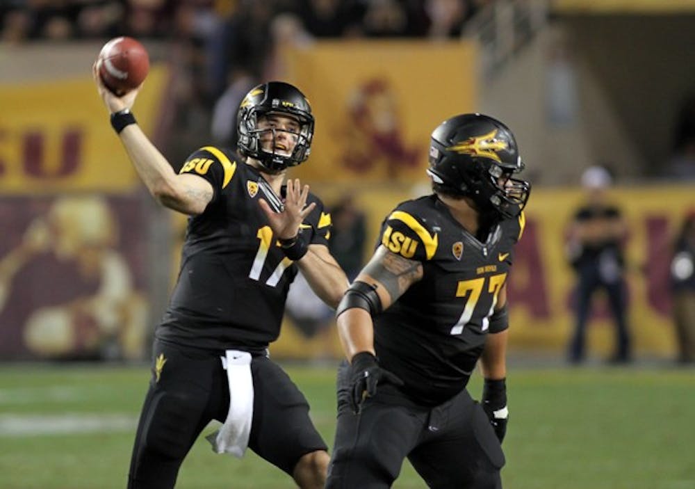 ASU junior quarterback Brock Osweiler slings a pass while senior offensive lineman Adam Tello blocks during the Sun Devils’ loss to UA on Saturday. ASU has mistakes to correct, but a win against Cal on Friday could propel them into the Pac-12 title game. (Photo by Lisa Bartoli)