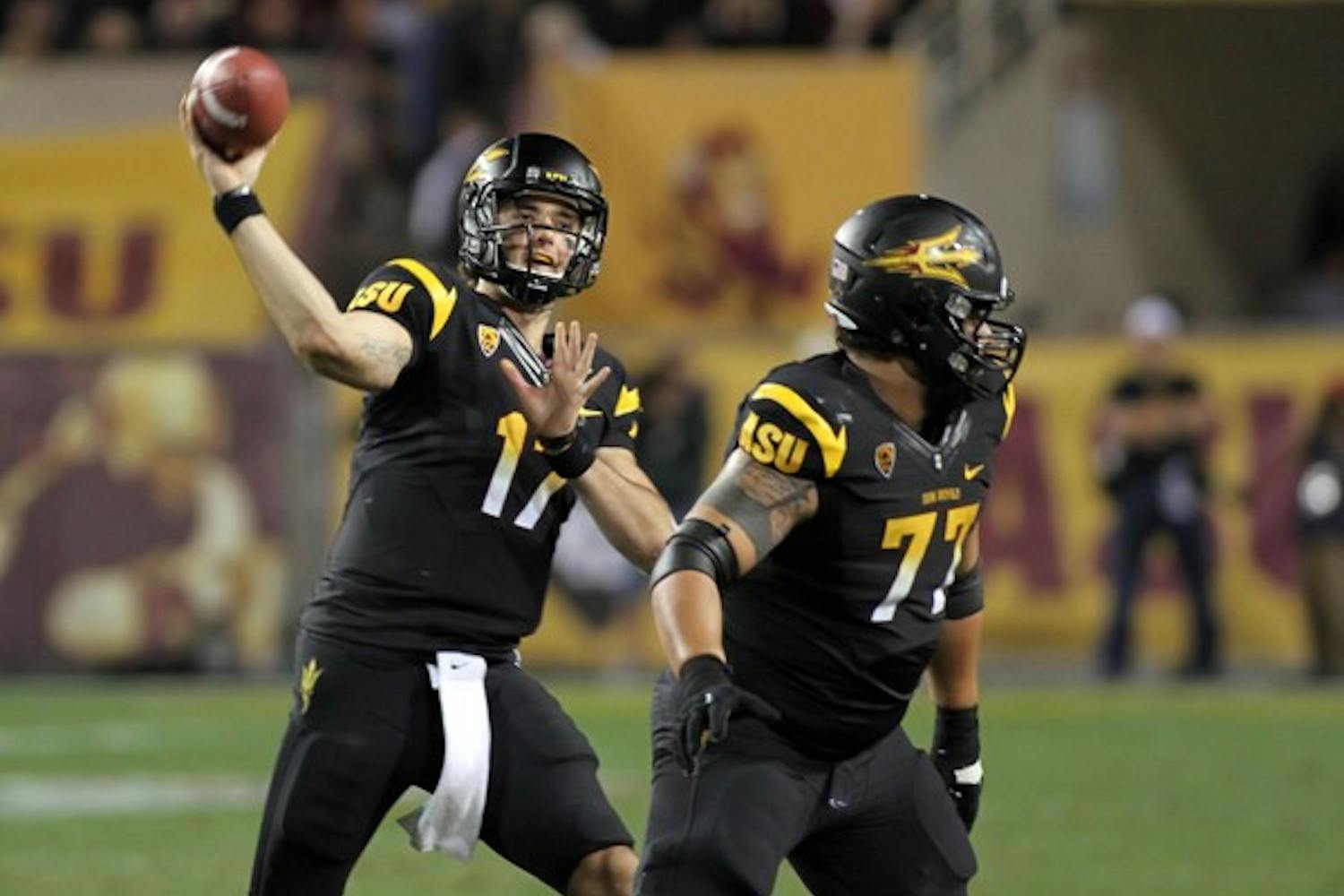 ASU junior quarterback Brock Osweiler slings a pass while senior offensive lineman Adam Tello blocks during the Sun Devils’ loss to UA on Saturday. ASU has mistakes to correct, but a win against Cal on Friday could propel them into the Pac-12 title game. (Photo by Lisa Bartoli)