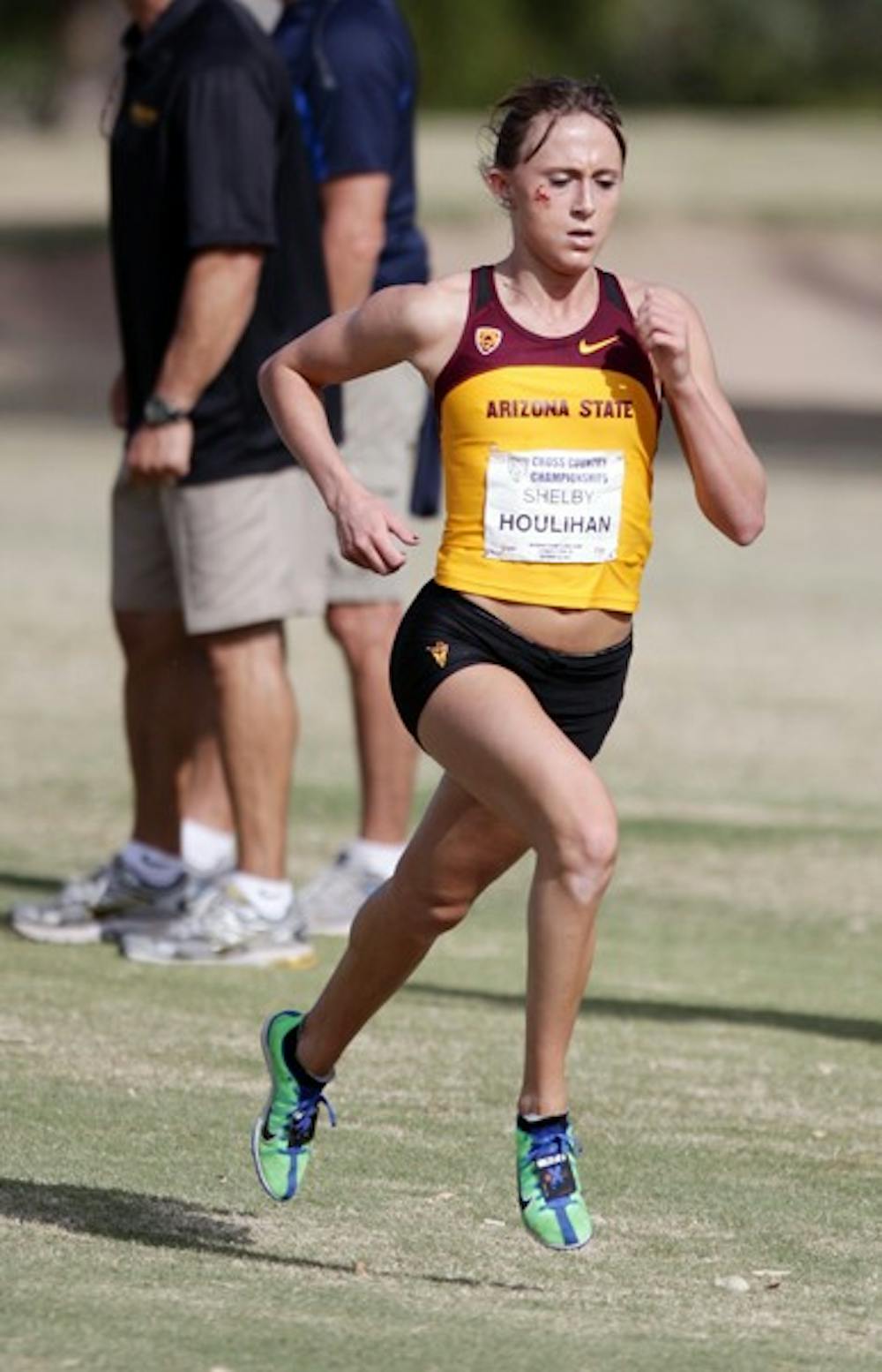 Then-freshman Shelby Houlihan closes in on the finish line during the Pac-12 Cross-Country Championships on Saturday. Houlihan’s second-place finish this weekend secured her spot in the indoor championships.  (Photo by Beth Easterbrook/The State Press)