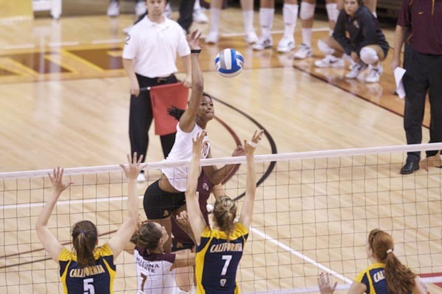 HARD HITTER: Sophomore middle blocker Erica Wilson jumps to spike a ball against California last weekend. After losing two games to start Pac-10 play last weekend, ASU travels to Tucson to take on UA. (Photo by Scott Stuk)