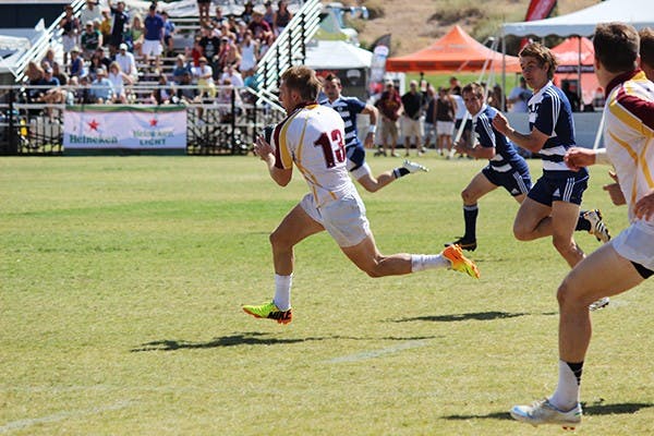 Senior center Adam Sandstrom runs toward the end zone at the Rugby Bowl against BYU on April 12. ASU lost to BYU 52-26.