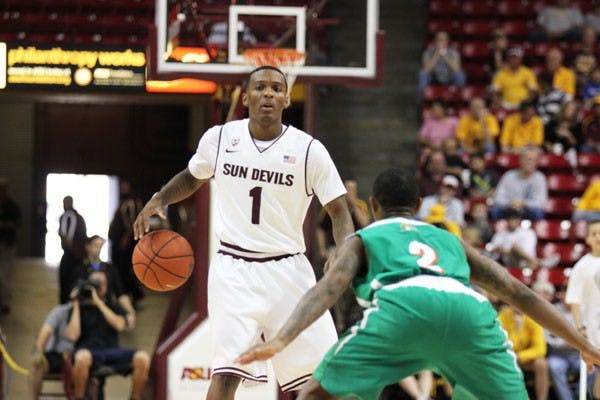Redshirt freshman guard Jahii Carson runs the point during the Sun Devils’ 97-70 win over Florida A&M on Nov. 18. (Photo by Kyle Newman)