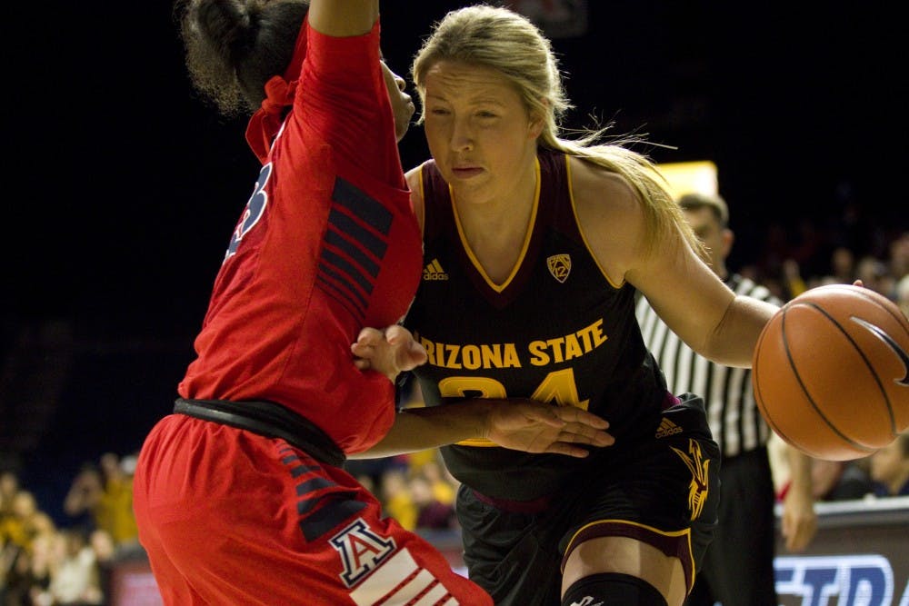 ASU senior guard Kelsey Moos (24) drives baseline during a women's basketball game versus the University of Arizona Wildcats in McKale Memorial Center in Tucson, Arizona on Friday, Feb. 17, 2017. ASU lost the game, 62-58. (Josh Orcutt/State Press)