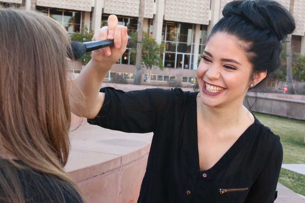 Lauren Moore works as a makeup artist to help boost women's self-esteem. Photo by Stella Atzenweiler.