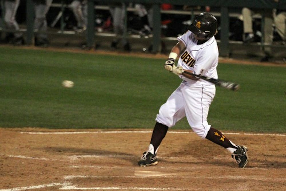 Jake Peevyhouse swings at a ball in a game against Texas Tech on Tuesday. Peevyhouse drove in the Sun Devils’ first run in their 8–4 loss to the Red Raiders. (Photo by Sam Rosenbaum)