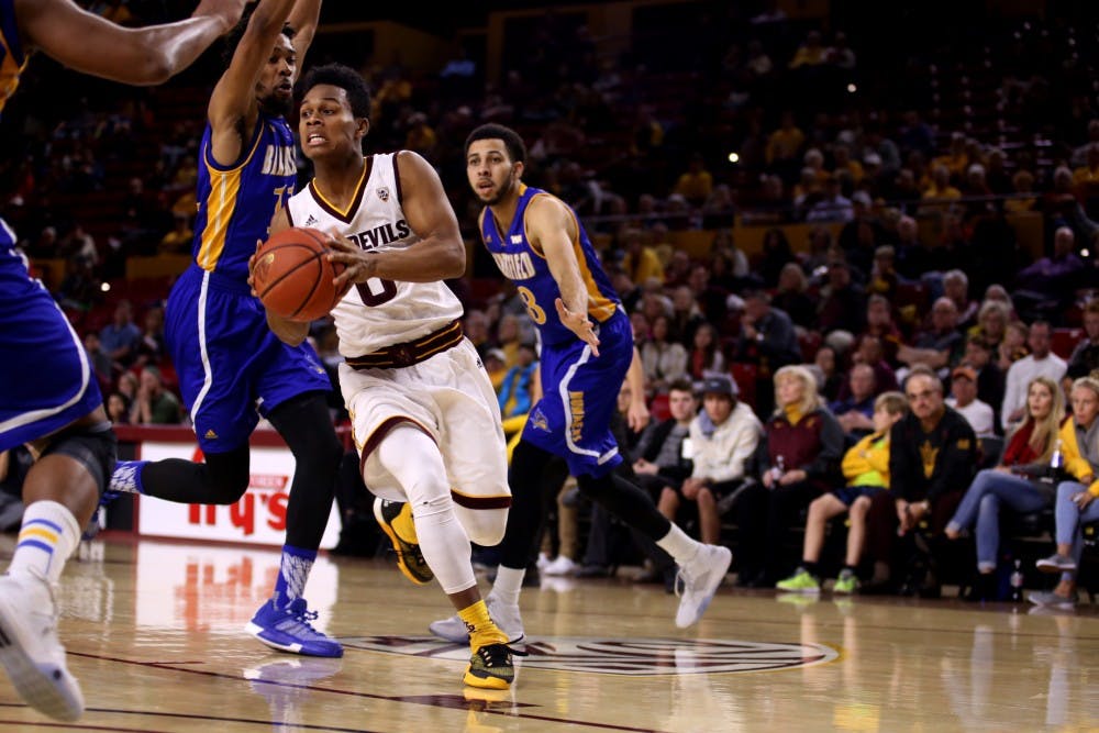 Sophomore guard Tra Holder (0) works against Cal State Bakersfield defense on Monday, Dec. 28, 2015, in Wells Fargo Arena. Arizona State went on to defeat CSUB 75-59. 