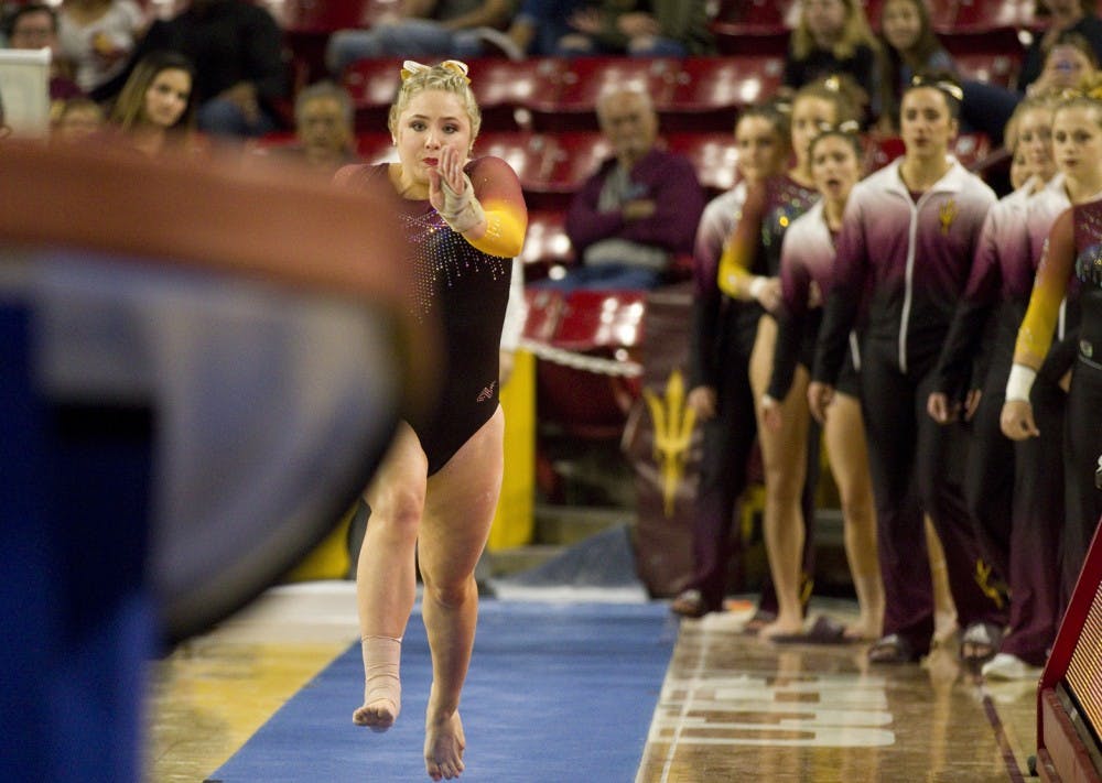 ASU freshman Jessica Ginn runs towards the vault during a gymnastics meet against the no. 5 ranked Utah Utes in Wells Fargo Arena in Tempe, Arizona on Saturday, Feb. 25, 2017. ASU lost the meet 197.600 to 194.850. (Josh Orcutt/State Press)